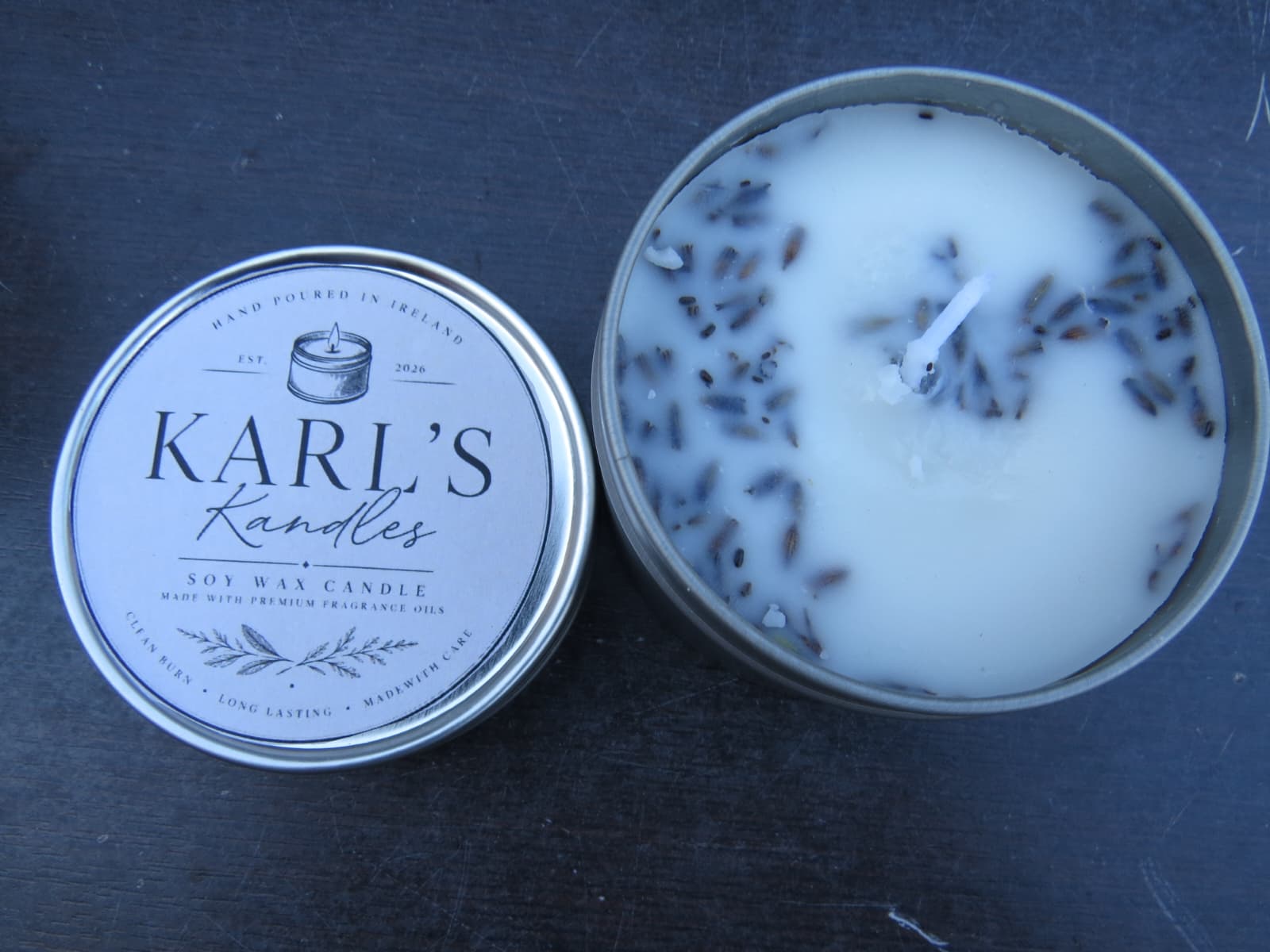 Karl's Kandles soy candle with its branded lid
